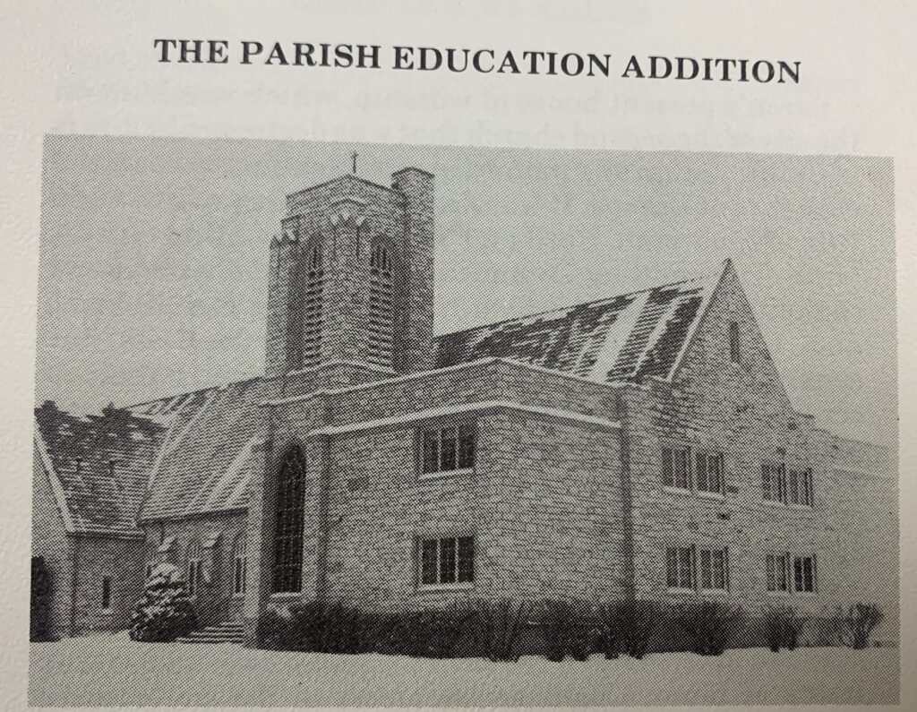 Black and white photo of new stone construction on stone church